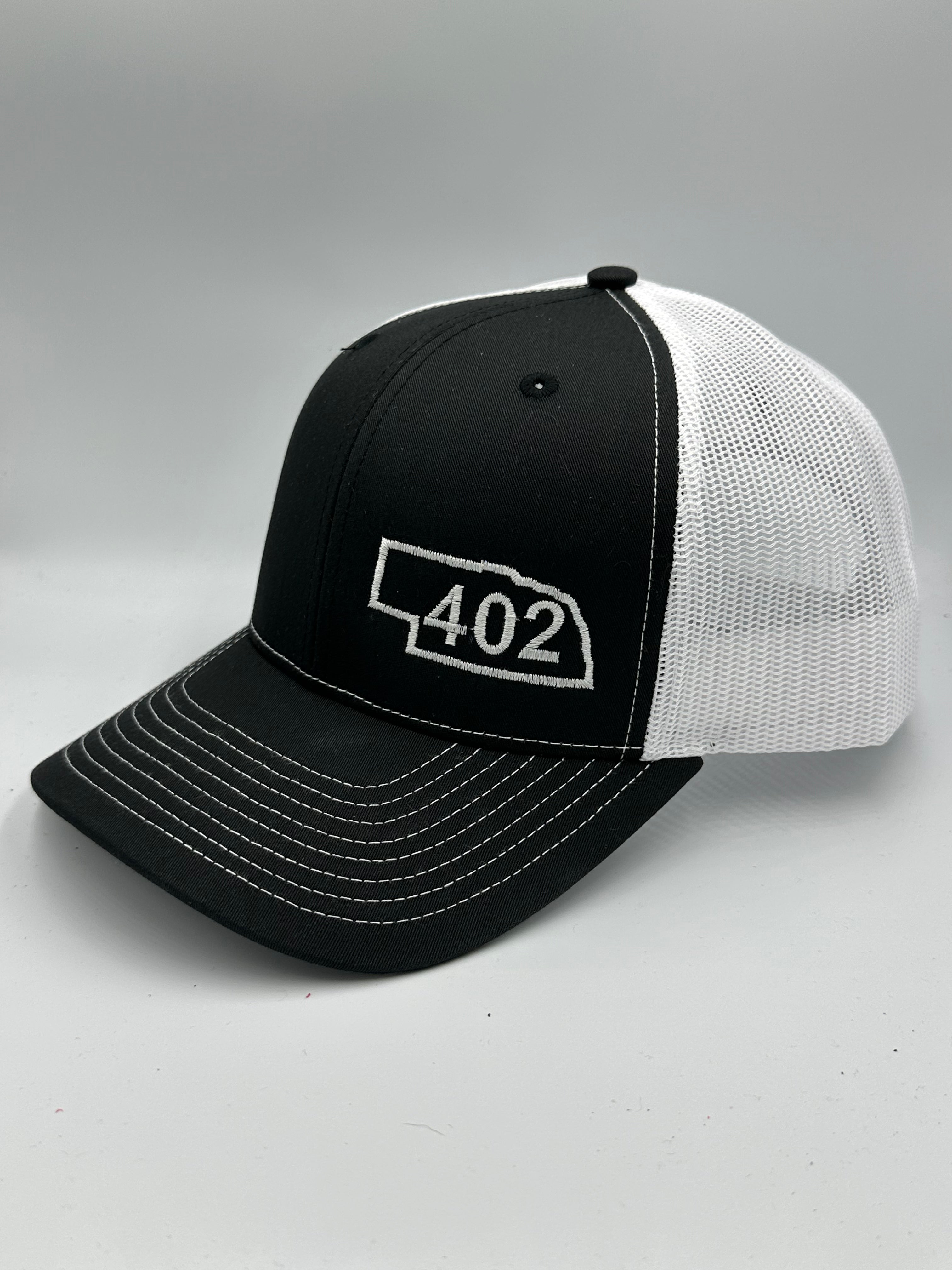 Nebraska 402 Trucker Hat Black